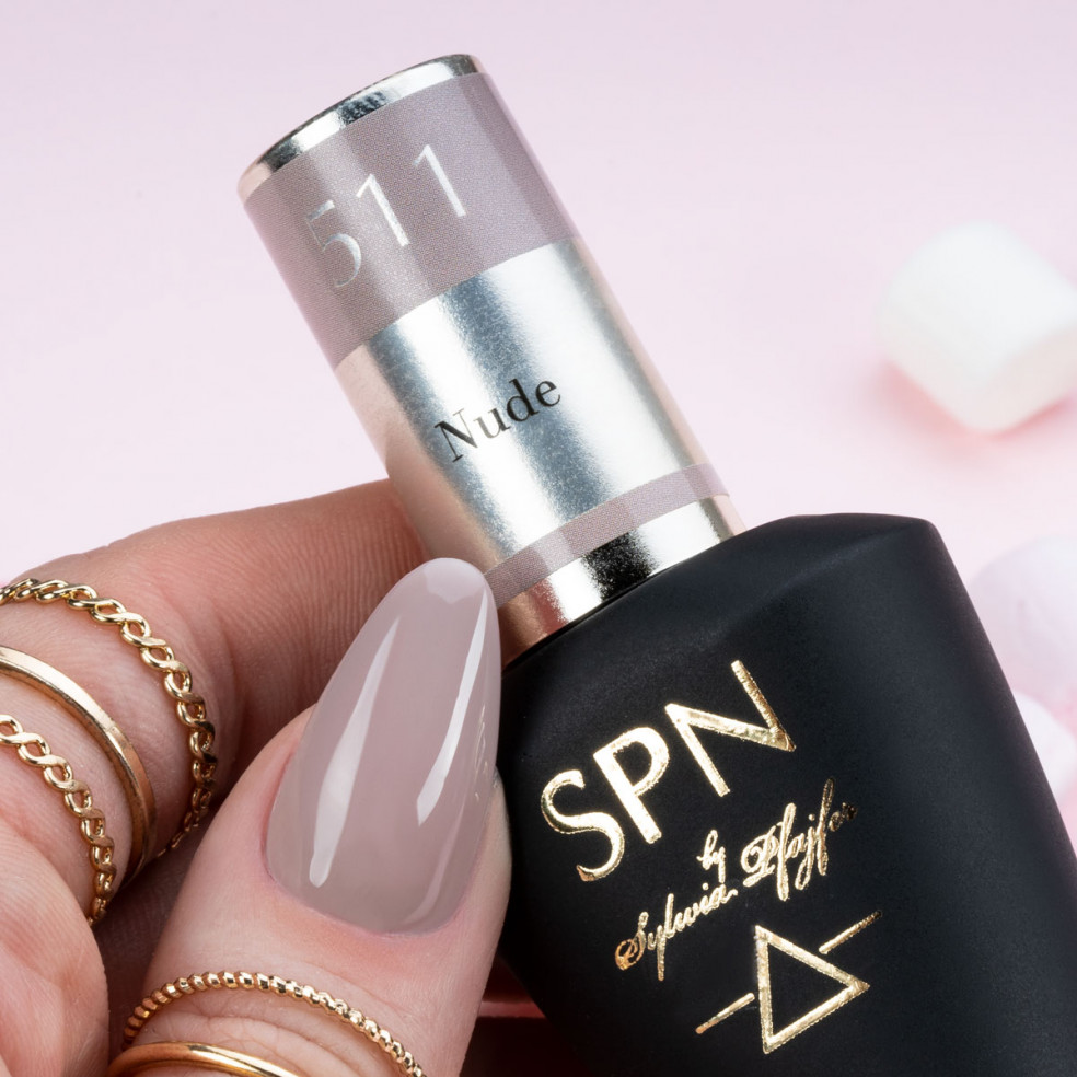 Butelka z lakierem i kciuk pomalowany kolorem 511 Nude Butelka z lakierem i kciuk pomalowany kolorem 511 Nude