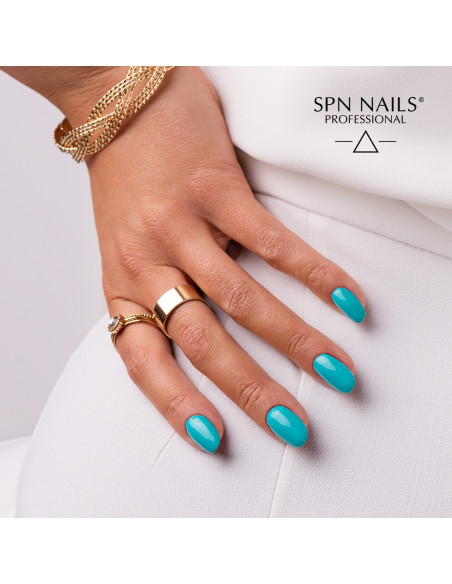 Manicure hybrydowy. Paznokcie pomalowane turkusowym lakierem hybrydowym  964 Caribbean Sea