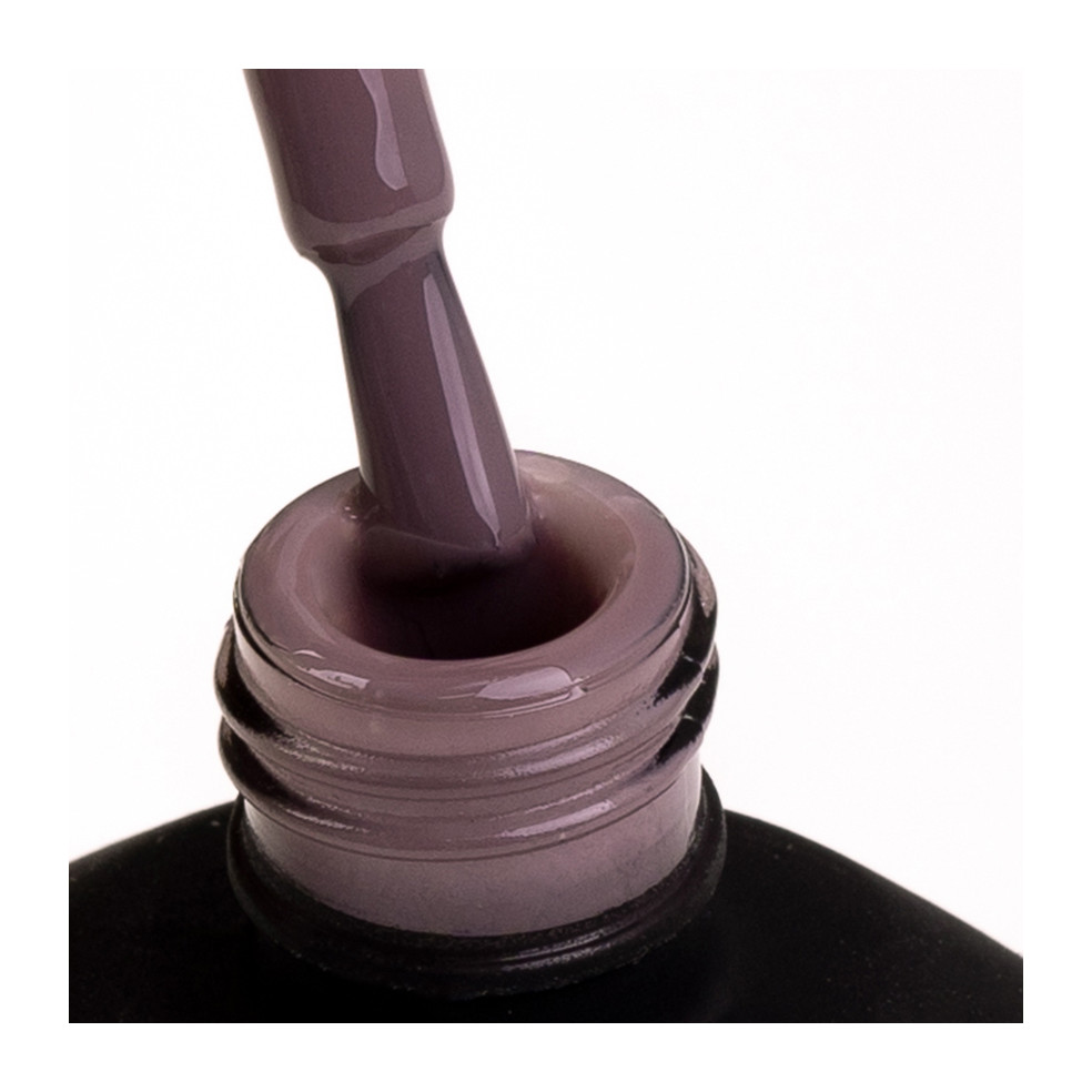 Pędzelek zanurzony w lakierze hybrydowym w kolorze jasnobrązowym Pędzelek zanurzony w lakierze hybrydowym w kolorze jasnobrązowym