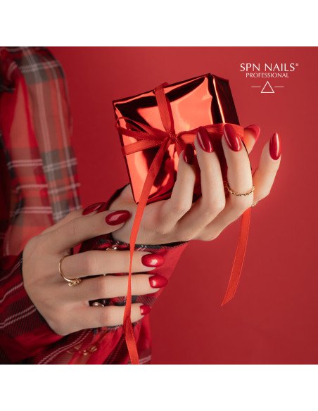 Manicure hybrydowy. Paznokcie pomalowame czerwonym brokatowym kolorem 1022 Make a Wish