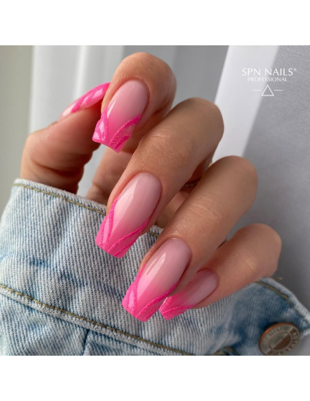 Paznokcie hybrydowe. Manicure wykonany przy użyciu lakieru hybrydowego w kolorze pudrowego różu Pudding French Paznokcie hybrydowe. Manicure wykonany przy użyciu lakieru hybrydowego w kolorze pudrowego różu Pudding French
