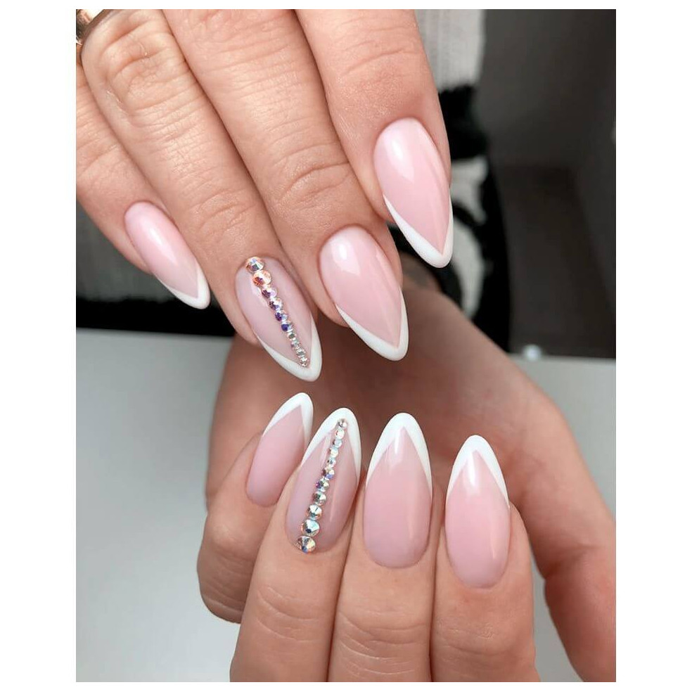 Paznokcie hybrydowe - stylizacja wykonana za pomocą lakieru hybrydowego w kolrze pudrowego różu Paznokcie hybrydowe - stylizacja wykonana za pomocą lakieru hybrydowego w kolrze pudrowego różu