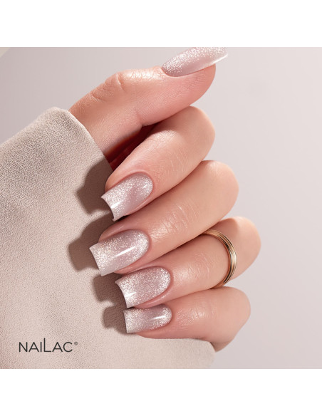 Paznokcie pomalowane topem hybrydowym Cat Eye Sparkle z magnetycznymi drobinkami flash Paznokcie pomalowane topem hybrydowym Cat Eye Sparkle z magnetycznymi drobinkami flash