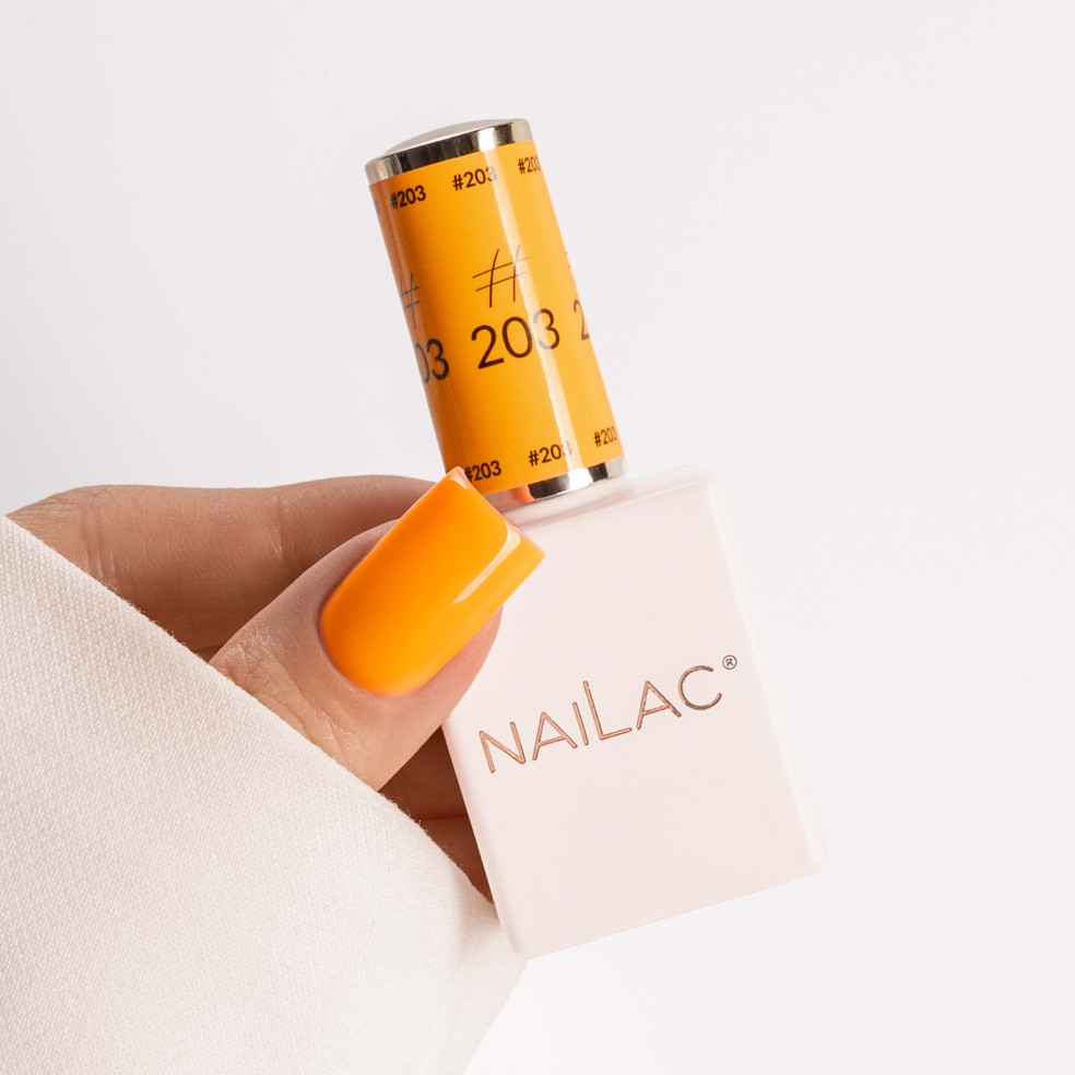 kciuk pomalowany pomarańczowym lakierem #203 NaiLac